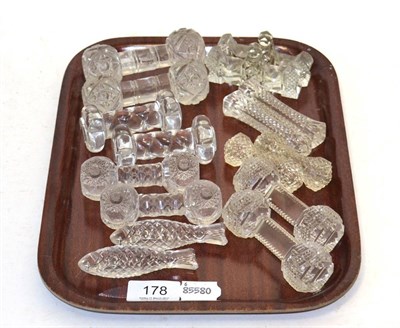 Lot 178 - Eight pairs of cut glass knife rests including fish form examples