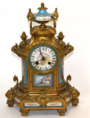 Lot 182 - A gilt metal and porcelain mounted clock