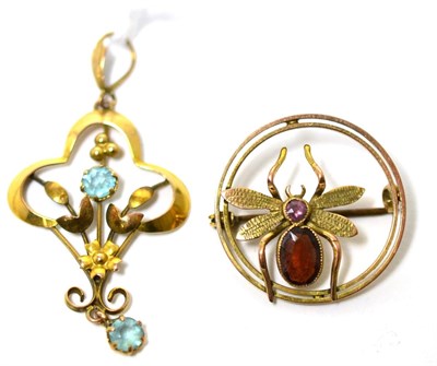 Lot 210 - An aquamarine Art Nouveau pendant and a garnet fly brooch