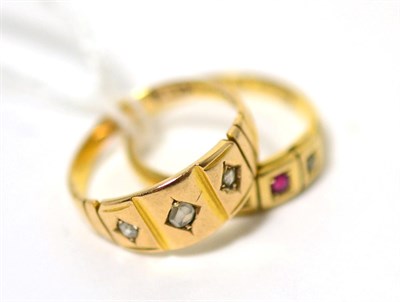 Lot 220 - An 18ct gold ruby and diamond three stone ring, finger size N1/2 and a 15 carat gold diamond...