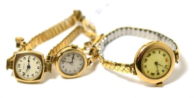 Lot 239 - A lady's wristwatch with case stamped 9ct, and two other 9ct gold lady's wristwatches (3)