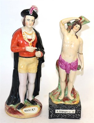 Lot 270 - Staffordshire figure of St Sebastian and similar figure of Hamlet