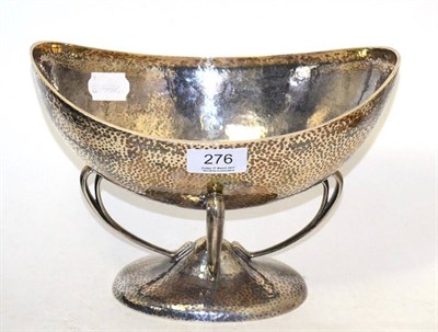 Lot 276 - A silver dish with hand hammered decoration, on four whiplash supports, by JBLD, Birmingham