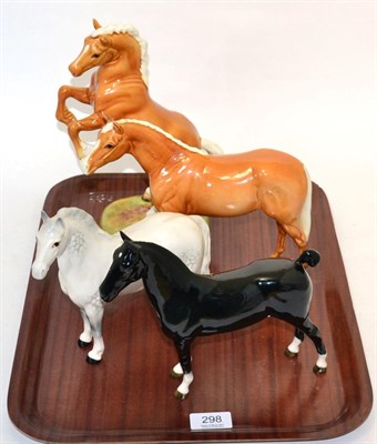 Lot 298 - Beswick horses comprising; rearing Welsh cob, model. No. 1014, Welsh cob, large thoroughbred...