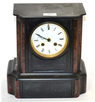 Lot 300 - A black slate and marble striking mantel clock