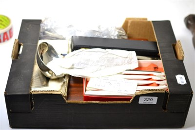 Lot 329 - A silver cigarette case, silver paper knife, plated cutlery, mother of pearl cutlery etc