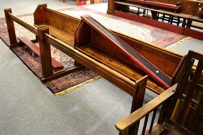 Lot 1088 - A pair of pine church pews with integral kneelers