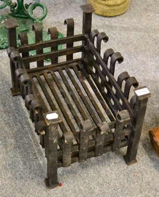 Lot 1092 - Two cast iron fire baskets