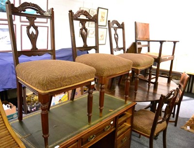 Lot 1100 - A set of four caved mahogany chairs, an early 20th century oak and leather carver together with...