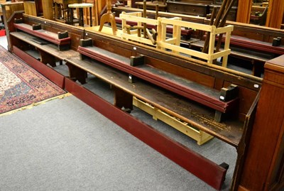 Lot 1113 - Two pine church pews, together with six padded kneeling benches