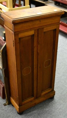 Lot 1114 - A cedar wood cigar cabinet with paper labels for Sancho Panza Habana cigars