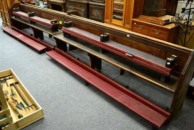 Lot 1115 - A pair of pine church pews, together with eight padded kneeling benches