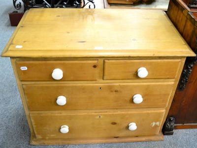 Lot 1129 - A pine chest of drawers