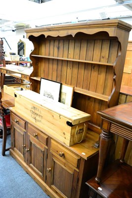 Lot 1133 - A modern pine dresser with plate rack