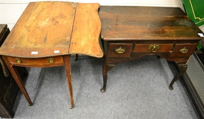 Lot 1146 - An 18th century oak lowboy and a Pembroke table