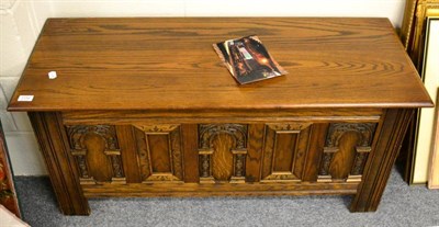 Lot 1152 - A 20th century carved oak blanket box