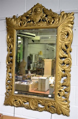 Lot 1165 - A Victorian gilt carved mirror