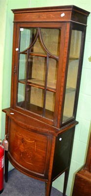 Lot 1255 - An Edwardian display cabinet