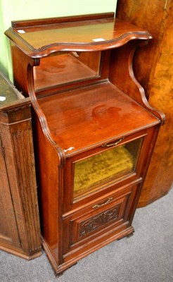 Lot 1269 - A late Victorian/Edwardian carved walnut musical cabinet, with superstructure back above a...