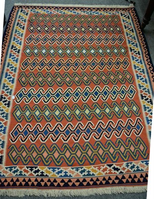 Lot 1272 - A modern Kashgai Kilim, South West Iran, the terracotta field with rows of reciprocal stepped...