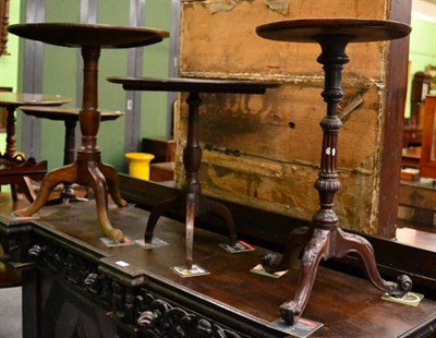 Lot 1279 - Three 19th century tripod tables, one with tilt top