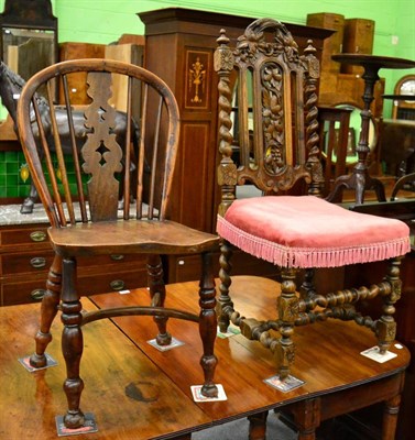 Lot 1284 - A carved oak hall chair and a yew wood Windsor chair&nbsp