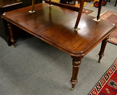 Lot 1286 - A Victorian mahogany extending dining table with turned legs