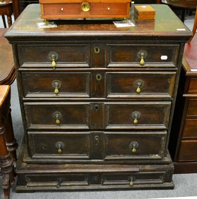 Lot 1293 - A 17th century oak chest on stand