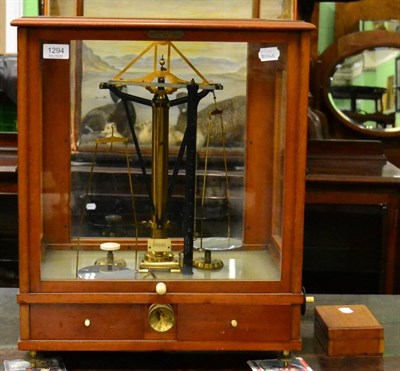 Lot 1294 - A mahogany and glass cased balance by L Gerting Ltd USA patent 7 Nov. 1916, presented by I.C.I...