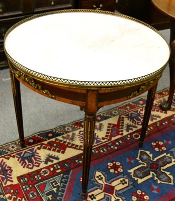 Lot 1298 - A French centre table with marble top