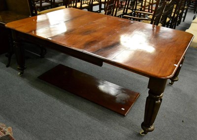 Lot 1301 - A 19th century mahogany extending dining table with three additional leaves