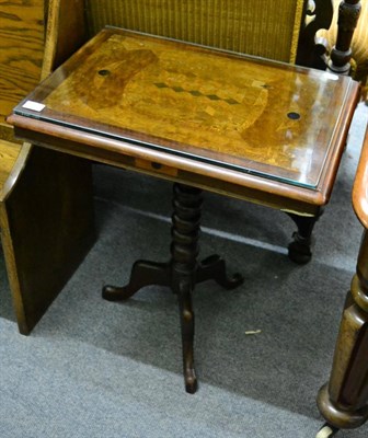 Lot 1302 - A 19th century marquetry inlaid tripod table with a bold barley twist standard