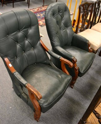 Lot 1307 - A gentleman's button back leather arm chair together with another button back chair in matching...