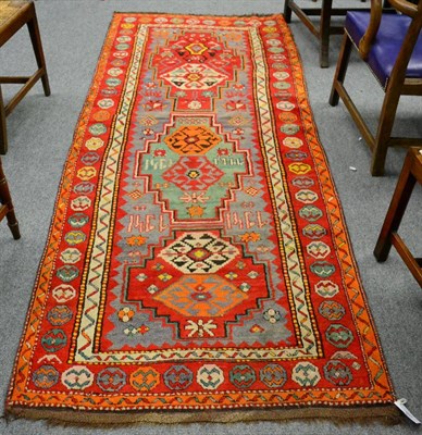 Lot 1310 - A Talish rug, Central Caucasus, the field with a column of stepped and hooked medallions,...