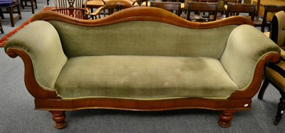 Lot 1315 - A Victorian mahogany framed humpback scroll end serpentine fronted sofa