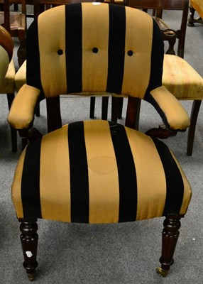 Lot 1316 - A William IV mahogany framed open armchair with striped upholstery