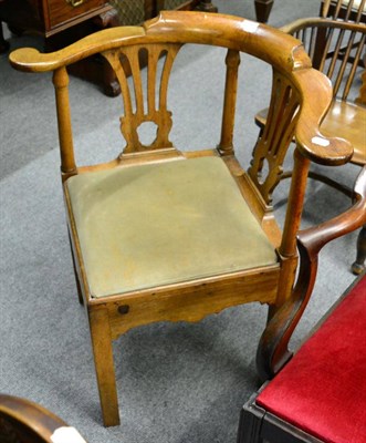 Lot 1320 - A George III mahogany corner chair