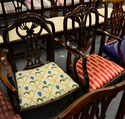 Lot 1323 - Two carved mahogany armchairs