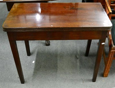 Lot 1330 - A 19th century mahogany fold over tea table