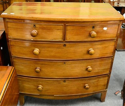 Lot 1336 - A George III mahogany bow fronted four height chest of drawers