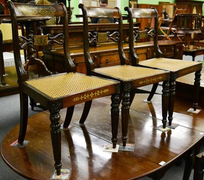 Lot 1339 - Three Regency chairs with brass inlay