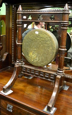 Lot 1359 - A carved oak dinner gong in the Gothic taste