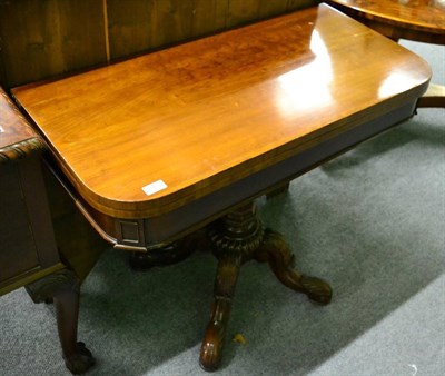 Lot 1383 - A mahogany fold over card table