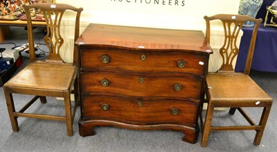 Lot 1385 - A pair of George III style oak plank seated chairs