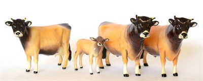 Lot 77 - Beswick Cattle Comprising: Jersey Bull Ch.";Dunsley Coy Boy";, model No. 1422, another, Jersey...