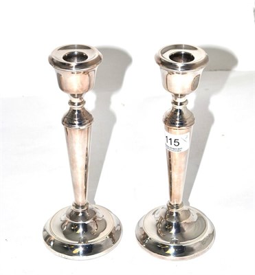 Lot 115 - A pair of Georgian style silver candlesticks, Sheffield, 1972, 21.5cm in height (2)