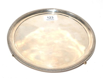 Lot 123 - A George III silver waiter, by Peter & William Baterman, London, 1814, gadrooned rim, plain...