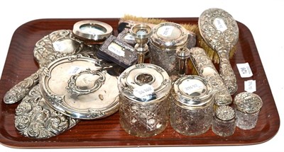 Lot 126 - An assortment of silver dressing table brushes, mirrors, photo frames and other items, various...