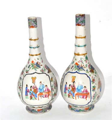 Lot 132 - A pair of 19th century Cantonese Chinese bottles of pear shape painted in famille rose enamels with
