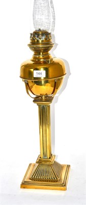 Lot 144 - A Victorian brass columnar oil lamp